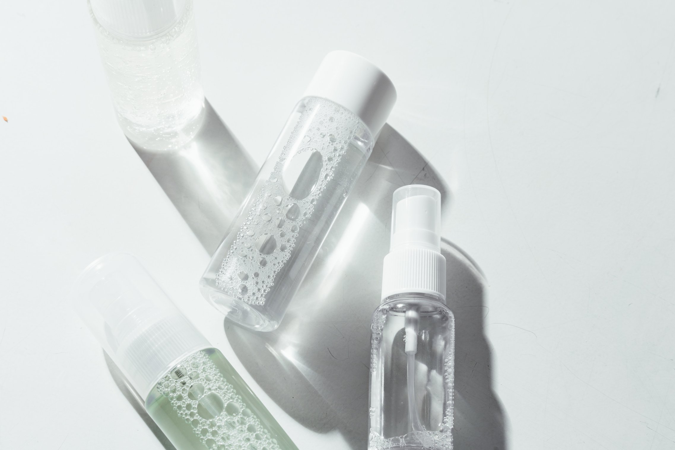 Beauty Product on Clear Cosmetic Bottles